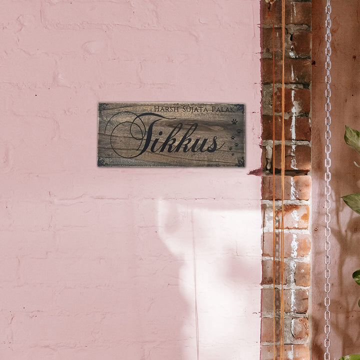 Rustic Wood Hand Painted Couple Name Plate With Co Ordinates - Mounted on Pink Brick Wall