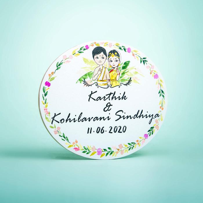 Round Hand Painted Character Name Plate South Indian Couple - Front View Showing Personalization