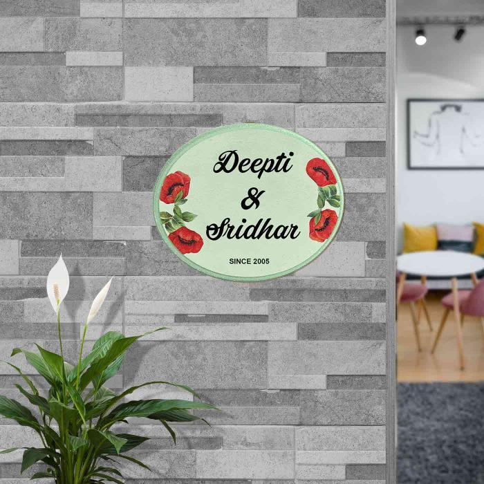 Decoupage Oval Name Plate With Green Background - Mounted on Entryway Wall