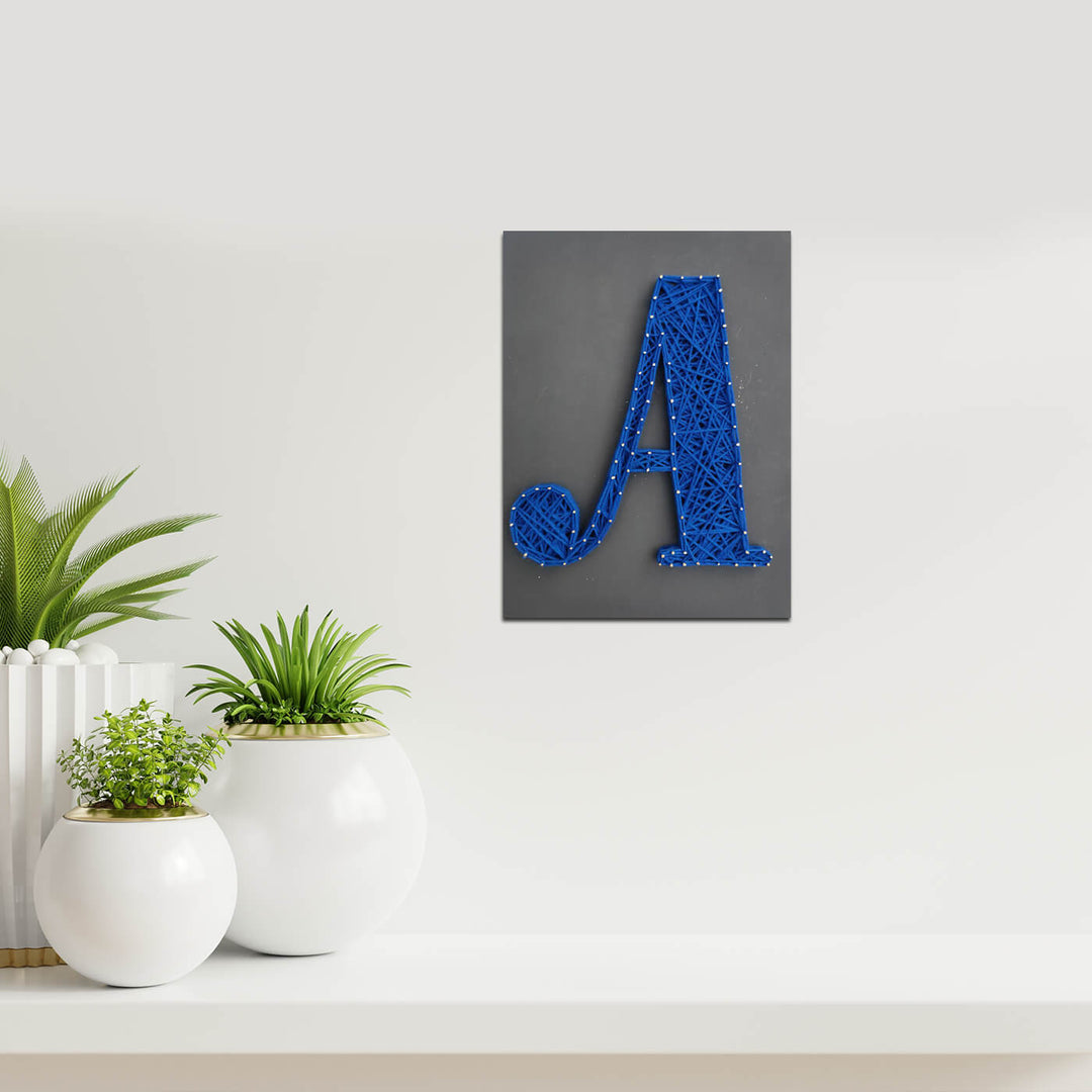 Personalised Alphabet String Art - Mounted on Wall Above Shelf