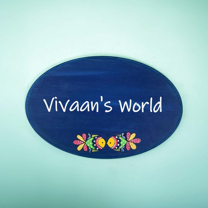 Kid S Room Blue Oval Name Plate With Madhubani Fish Art - Front View with Name Personalization