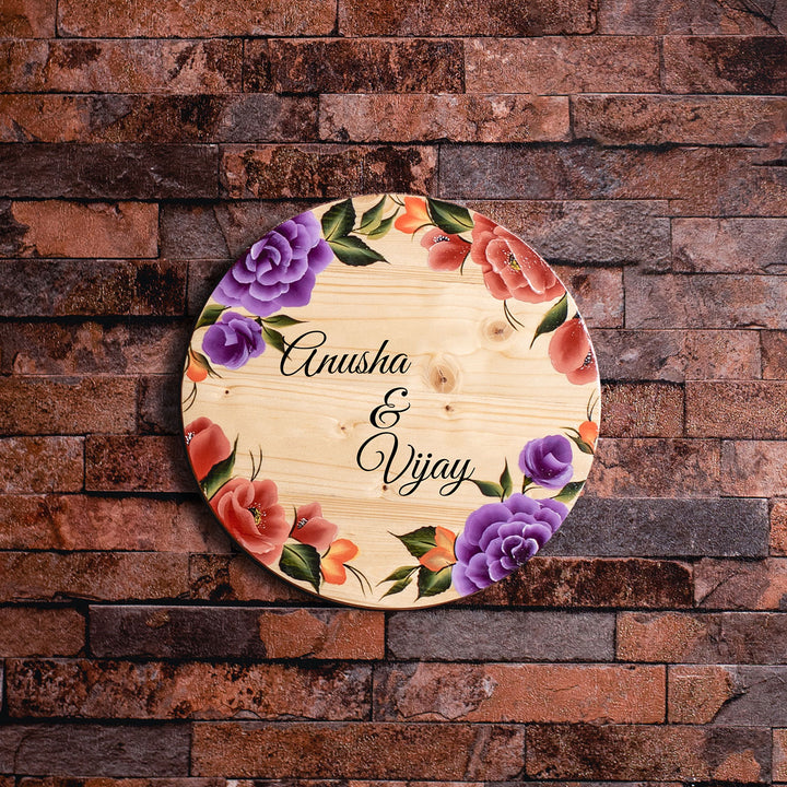 One Stroke Art Circular Name Plate With Couple Names 1 - Mounted on Brick Wall Front View