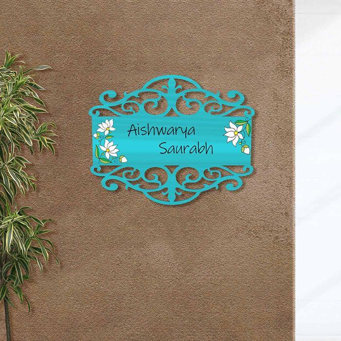 Teal Madhubani Name Plate With White Lotus Design - Mounted on Wall Showing Personalization